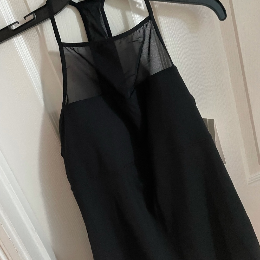 Gap Fit, black athletic top. Mesh front, and racer back. Built in bra